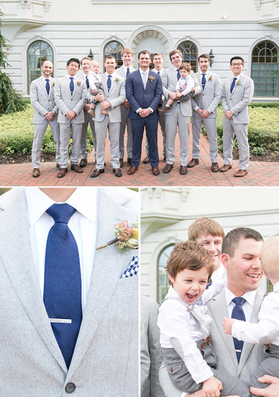Groomsmen in gray suits with navy ties at wedding party