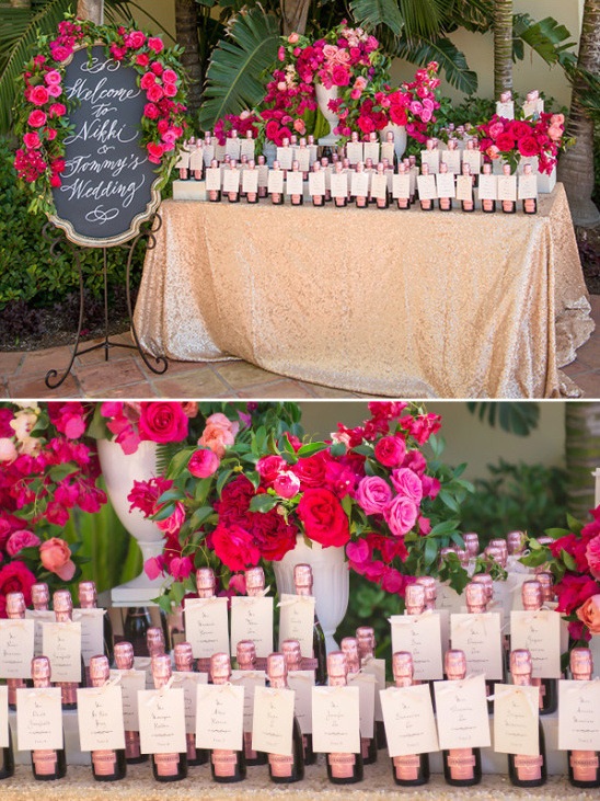 Welcome sign and mini champagne bottle escort cards