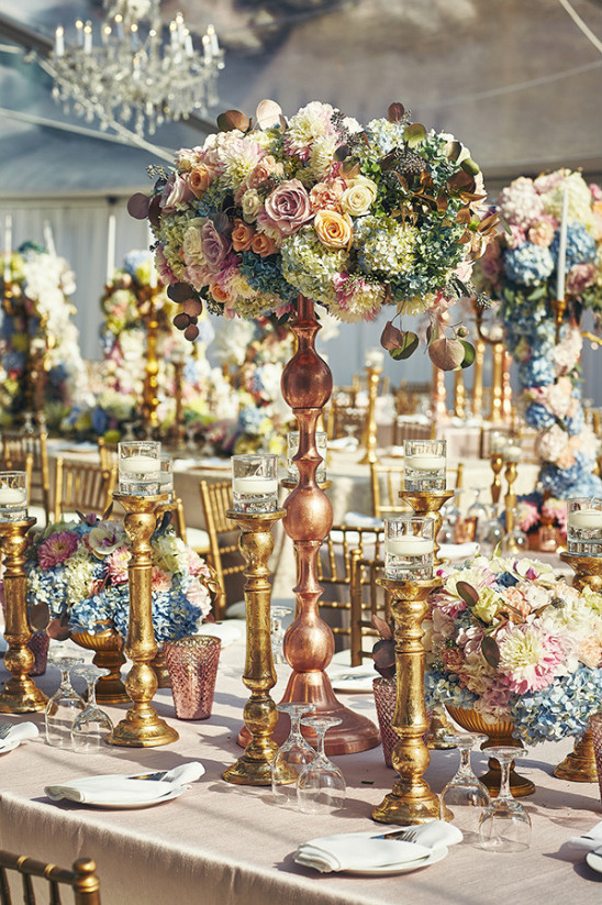 Elegant wedding reception flower centerpieces and candles