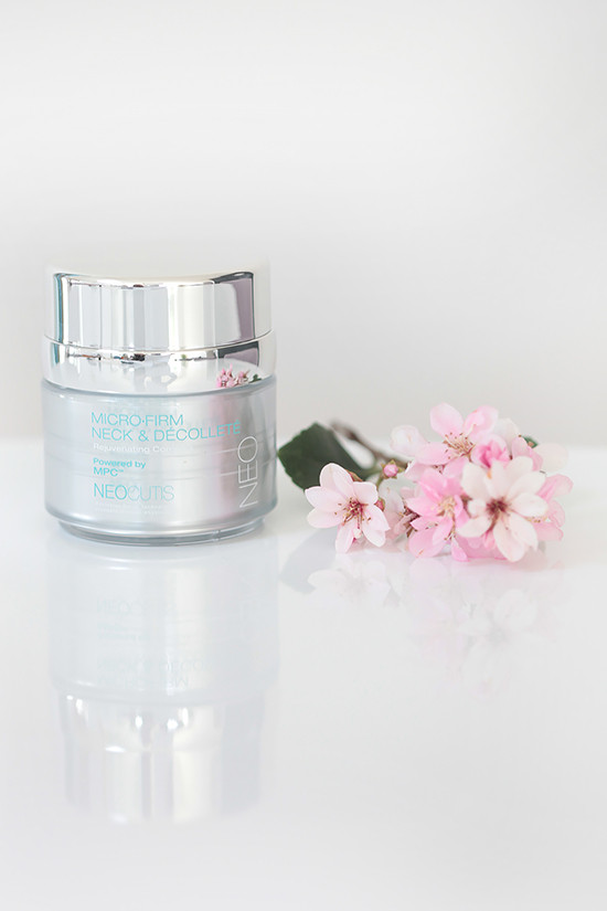 Here's an alt tag following your specifications:

NeoCutis Micro-Firm Neck & Decollete cream jar
