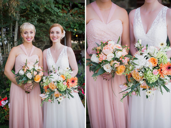 pink bridesmaid with peach and orange bouquet