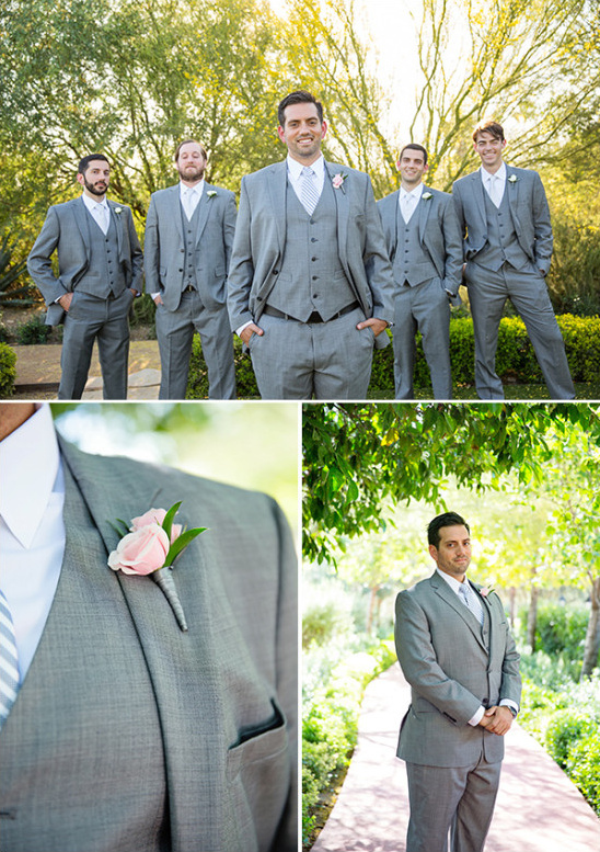 Groom and groomsmen in grey wedding suits outdoors