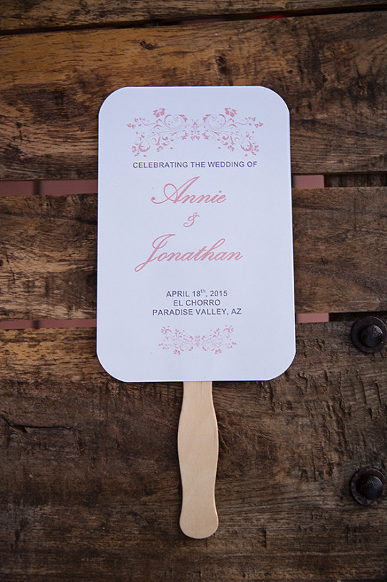 Annie and Jonathan wedding fan on wooden background