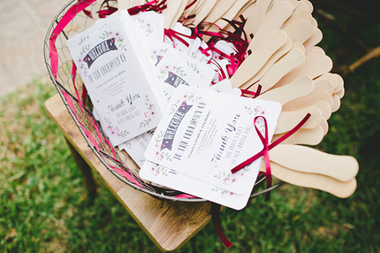 Wedding ceremony welcome fans with thank you notes