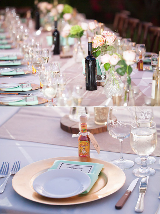Wedding table setting with wine glasses and flowers