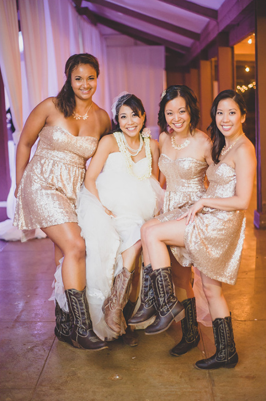 Bridesmaids in gold and cowgirl boots