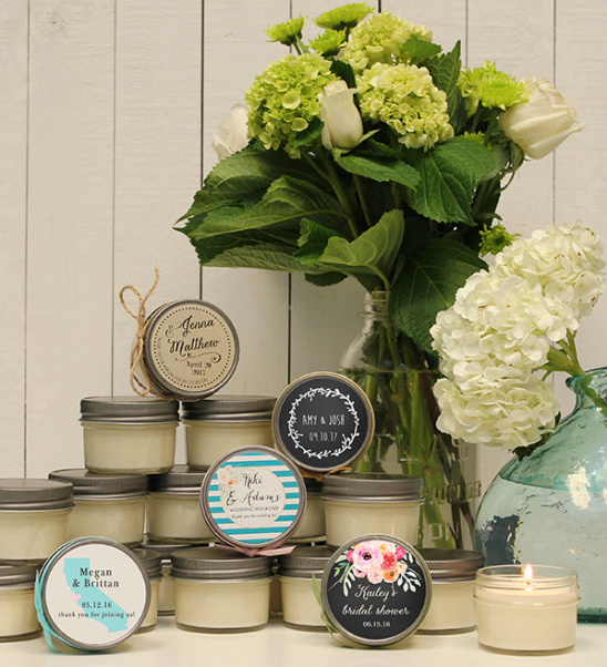 Personalized wedding favor candles with floral accents