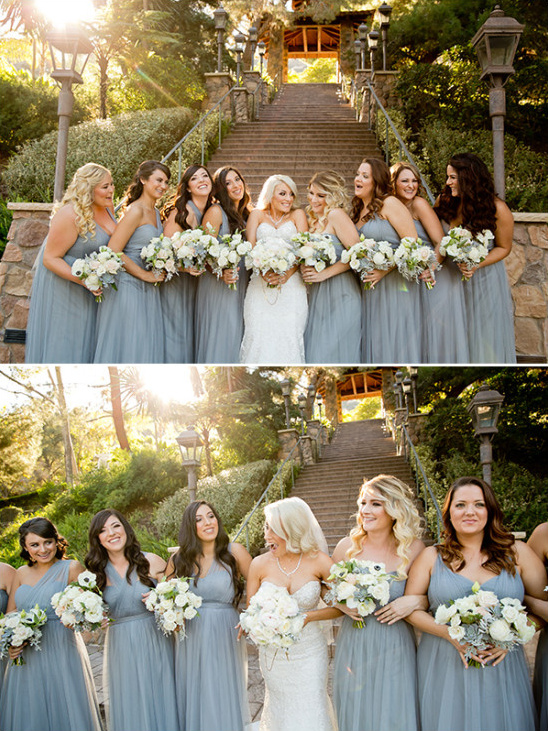 Bride and bridesmaids in dusty blue gowns outdoors