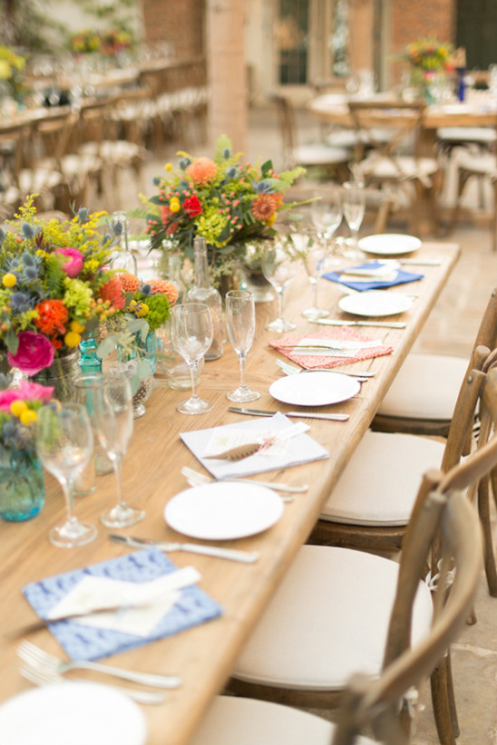 Elegant rustic wedding table setting with floral decor