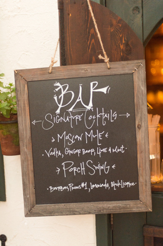 Bar chalkboard menu showing Moscow Mule and Porch Swing drinks