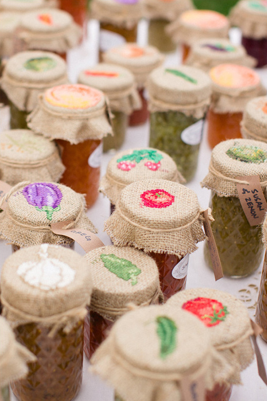 Homemade jars of fruit and vegetable preserves on display