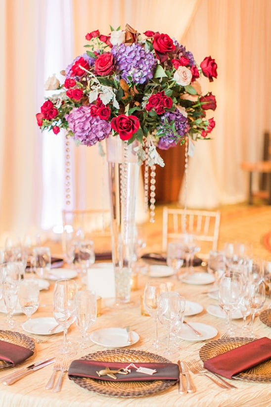Tall red and purple centerpiece