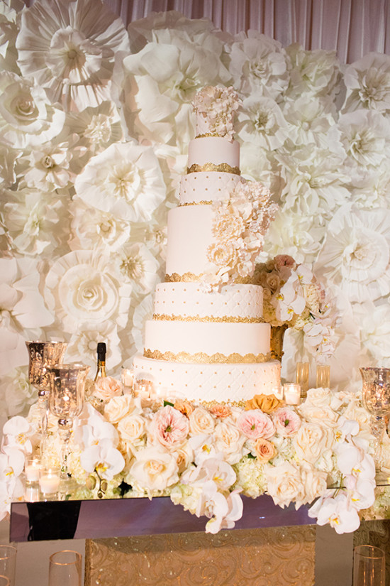 Seven tier wedding cake in white and gold