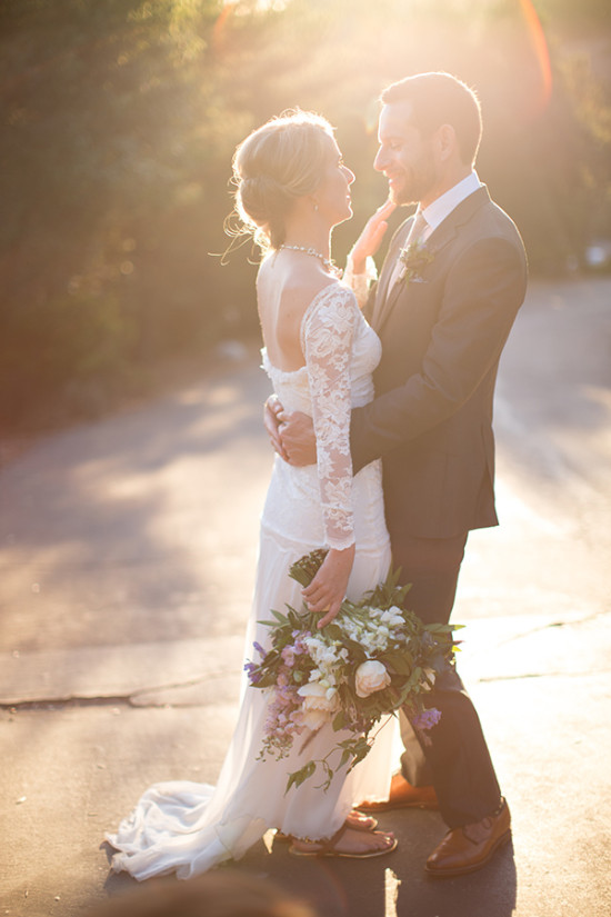 Romantic wedding portrait of a bride and groom in the sunlight