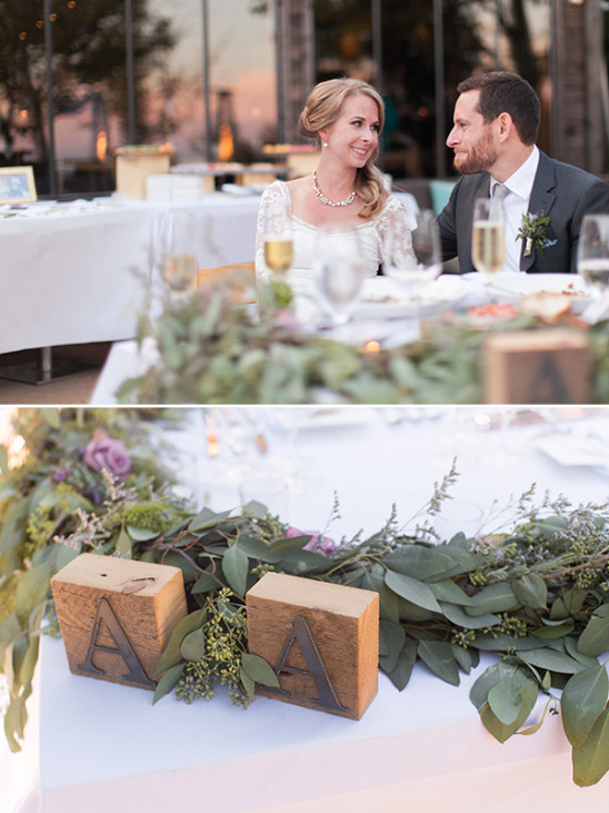 A romantic wedding couple at a beautifully decorated table