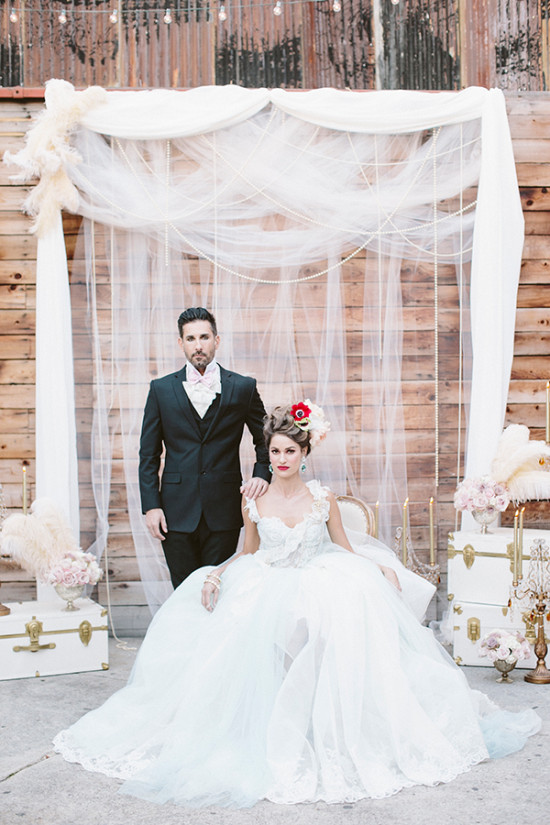 draped chiffon and pearls wedding backdrop