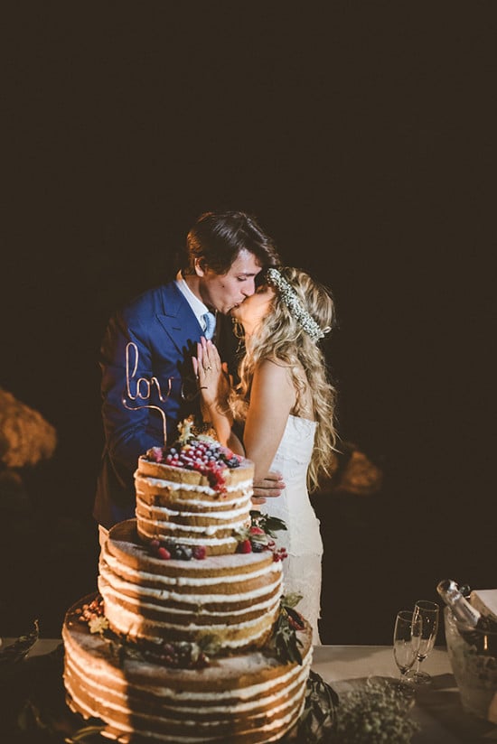 Naked wedding cake kiss