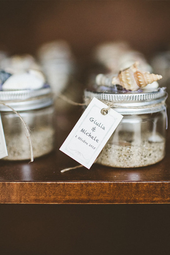 Jars of sand wedding favor with seashells