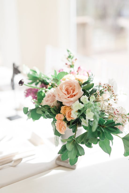 peach and pink and green floral centerpiece