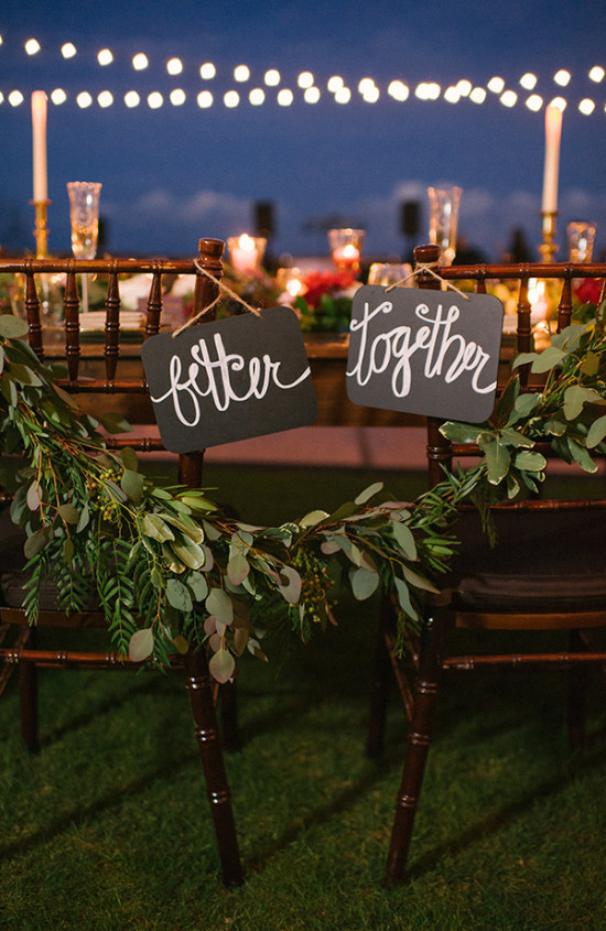 Sweetheart chair with signs