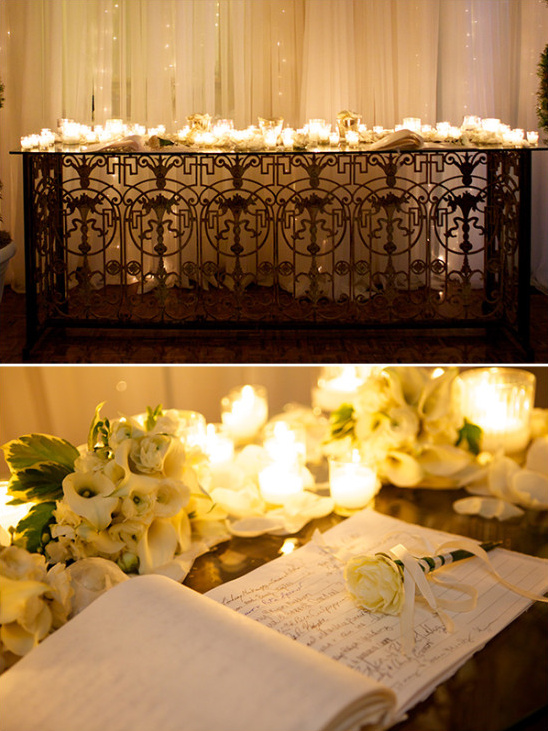Candle lit guest book table