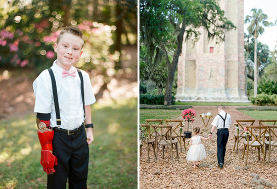 ring bearer in bow tie and suspenders