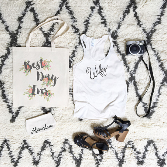 Bridal accessories and Best Day Ever tote bag on a rug
