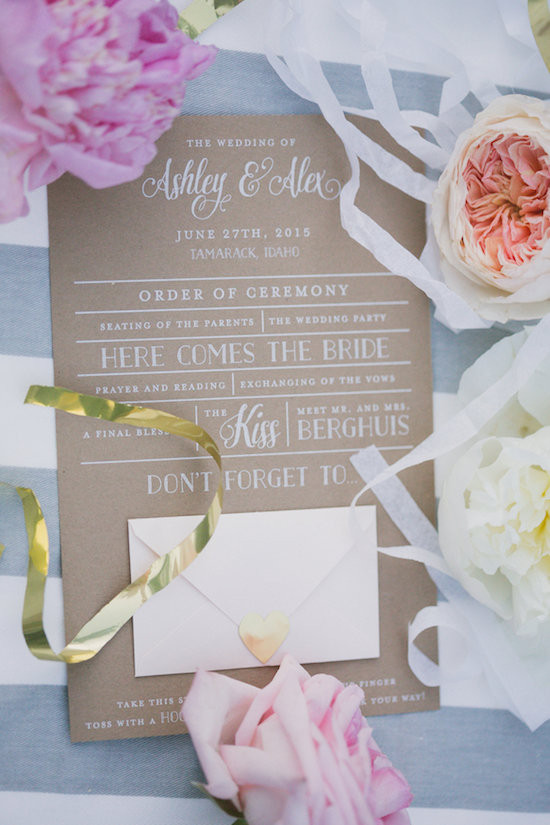 Elegant wedding invitation with flowers and golden accents
