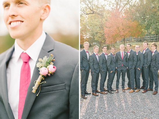 Groomsmen in gray suits and pink ties at an outdoor wedding