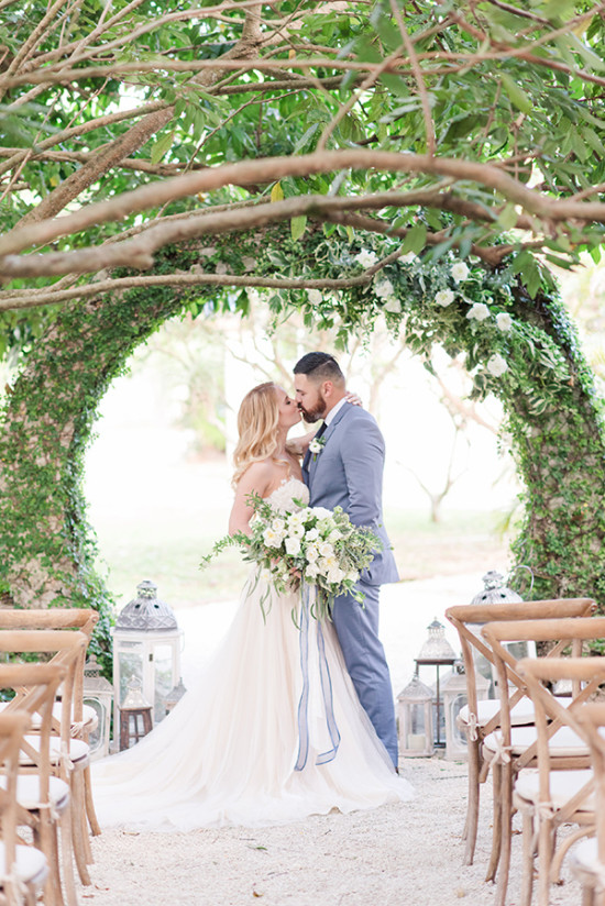 romantic hedge arch backdrop for wedding ceremony