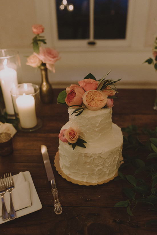 Wedding cake with floral topper