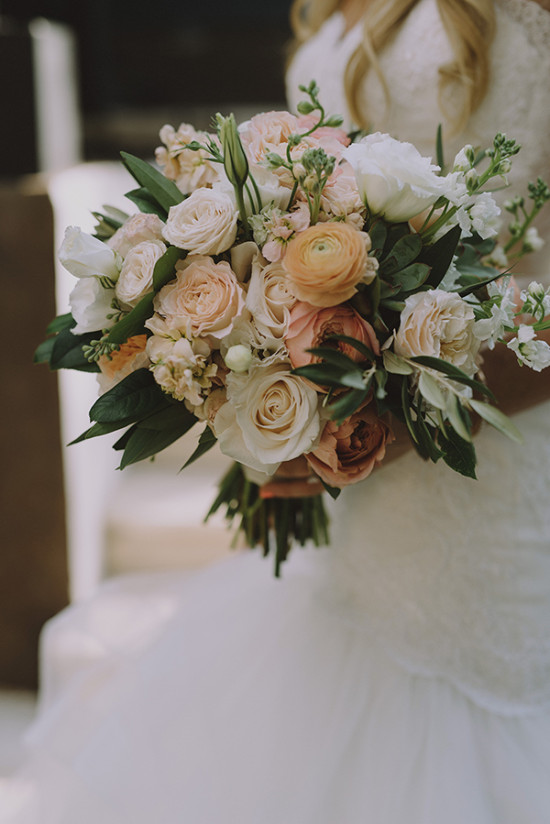 Wedding bouquet in peach and blush tones