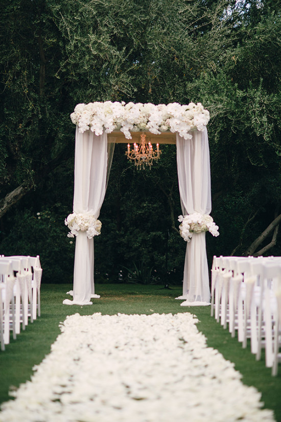 White wedding arch with chandelier