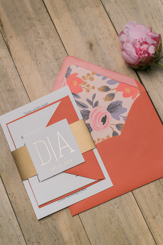 Elegant wedding invitation with floral envelope and peony flower