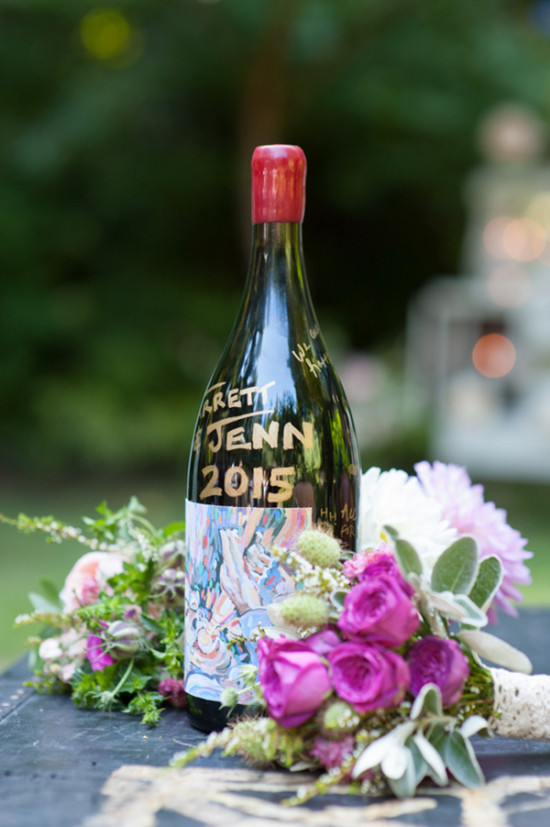 Wedding wine bottle with flowers, featuring a 2015 date and names
