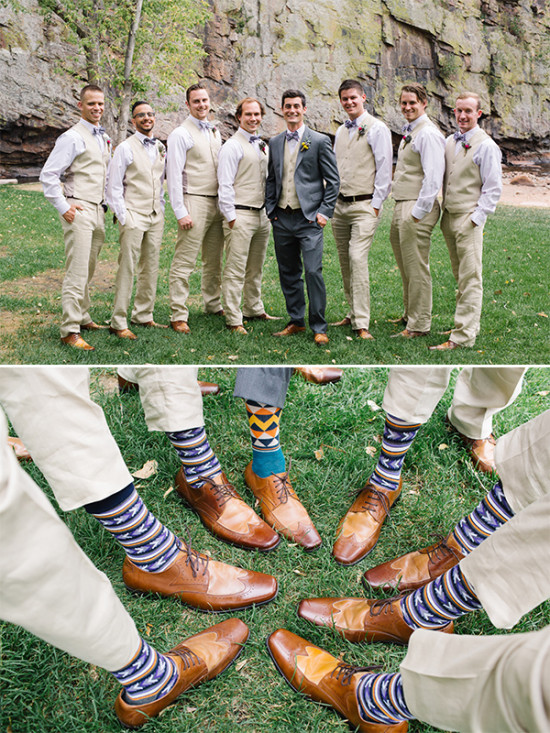 Groomsmen with stylish socks posing for a wedding day photo