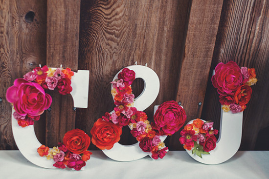 Wooden letters decorated with flowers for wedding decor