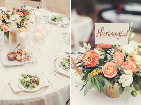 Elegant wedding table setting with floral centerpiece and food