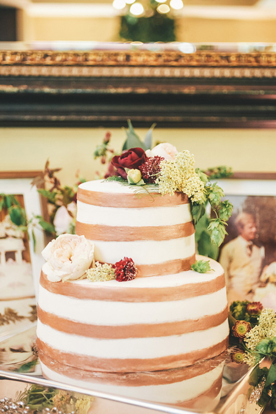 Gold and white stripped wedding cake