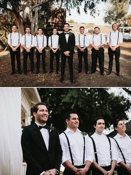 black and white groomsmen in suspenders