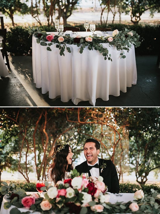 rose and eucalyptus garnished sweetheart table