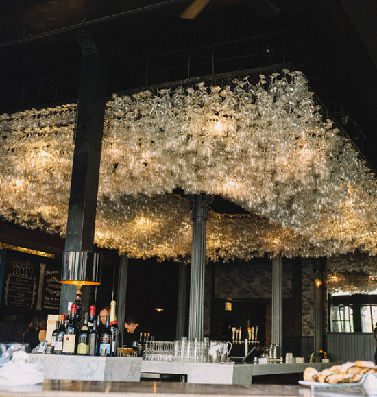 Unique bar decor with wine glasses chandelier design