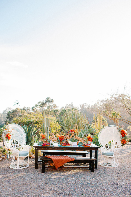 Teal and red desert wedding decor