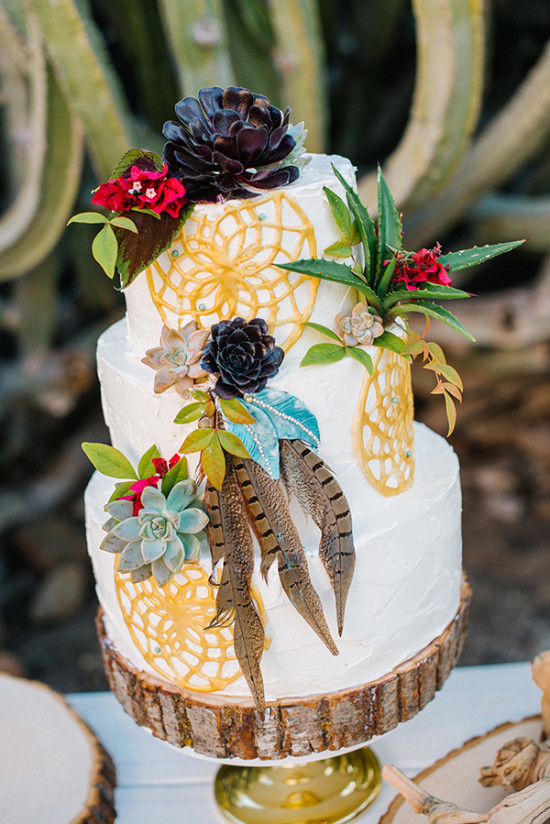 Wedding cake with dreamcatchers and feathers