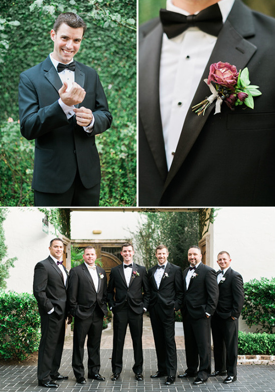 Groom and groomsmen in formal black tuxedos at a wedding