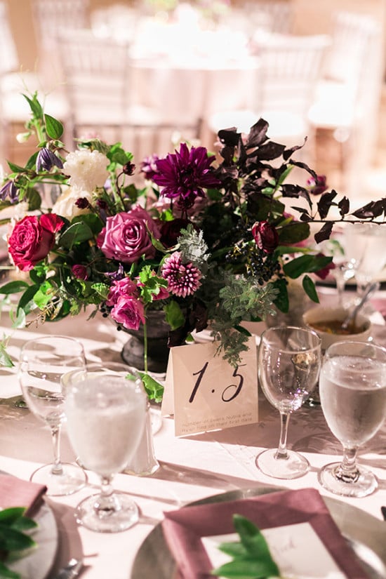 purple centerpiece and table number