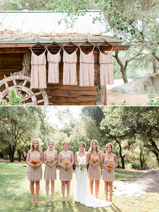Bridesmaids dresses hanging outside with the wedding party