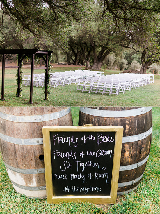 Wedding ceremony setup with chairs, barrels, and sign