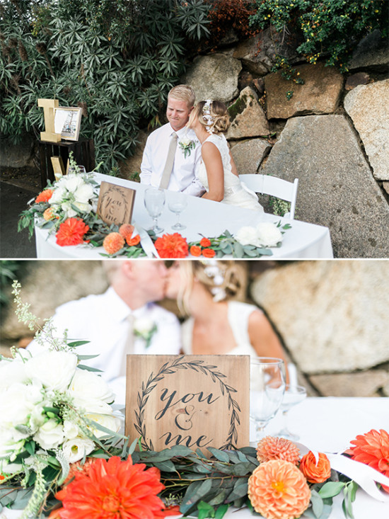 Bride and groom at wedding, with you & me sign, floral decor