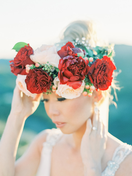 Bride with a vibrant flower crown, natural makeup, and wedding dress